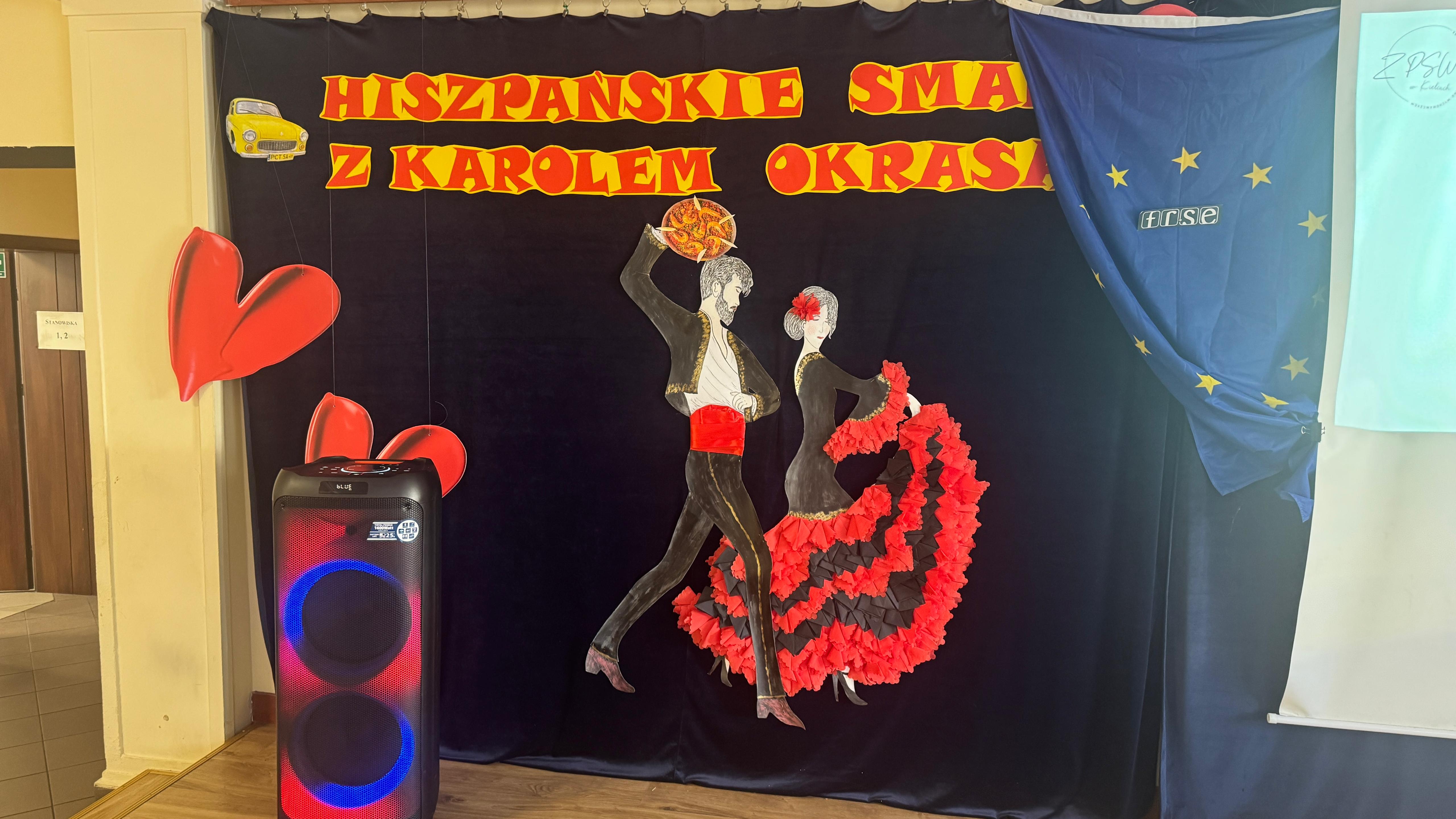 Dekoracja sceny podczas warsztatów kulinarnych - para tańcząca flamenco