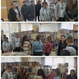 Pani bibliotekarka zapoznaje uczniów z rozmieszczeniem działów bibliotecznych i księgozbiorem.