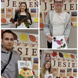 Wychowankowie pozują do zdjęcia z wykonaną na zajęciach jesienną ozdobą.