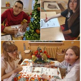 Wychowankowie uzupełniają kartę pracy o tematyce świątecznej.